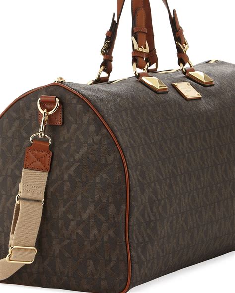 borsa michael kors jet set travel grande|michael kors duffel bag.